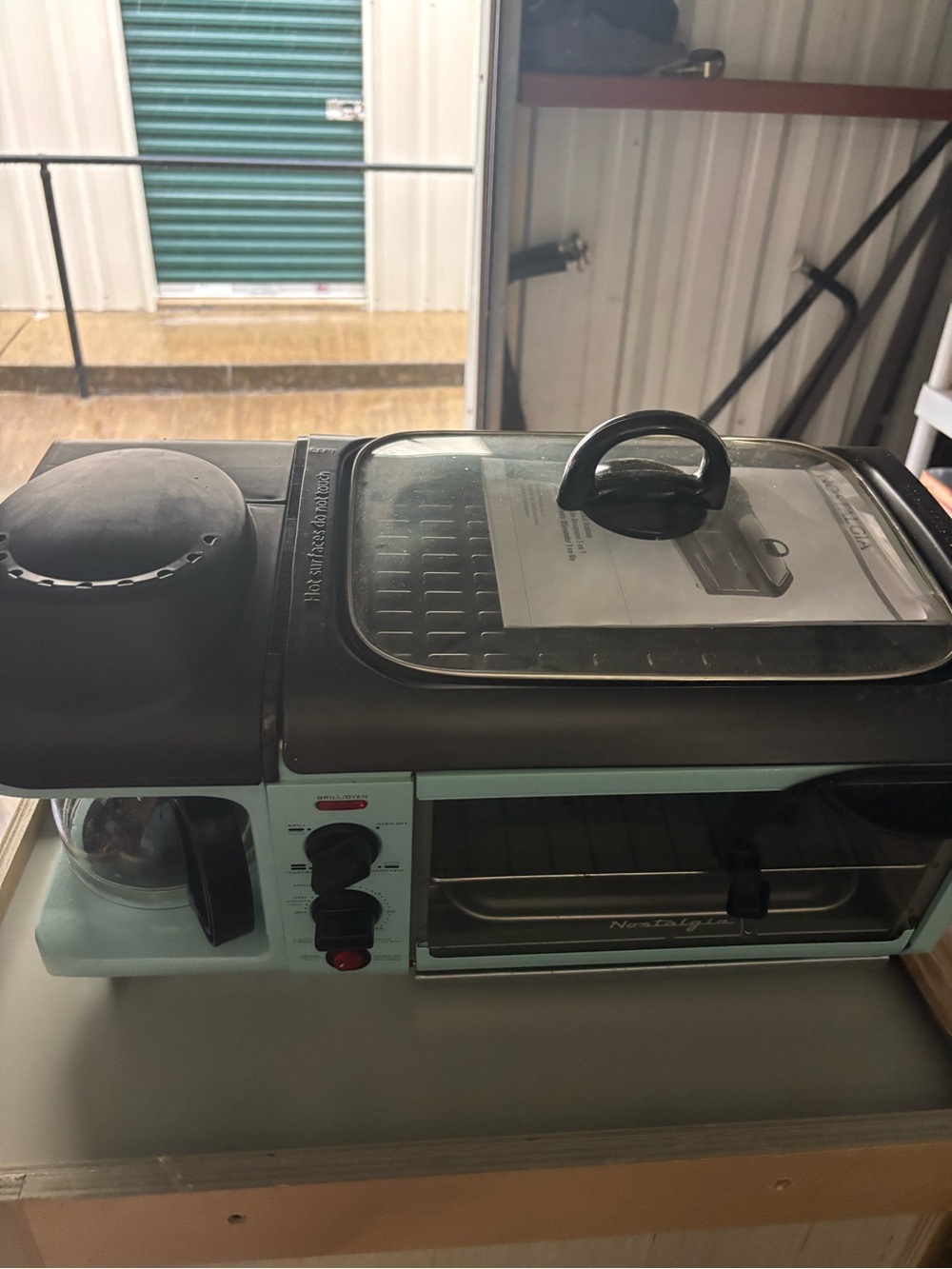 Nostalgia Mint and Black 3‑in‑1 Breakfast Station Toaster Oven with Coffee Maker